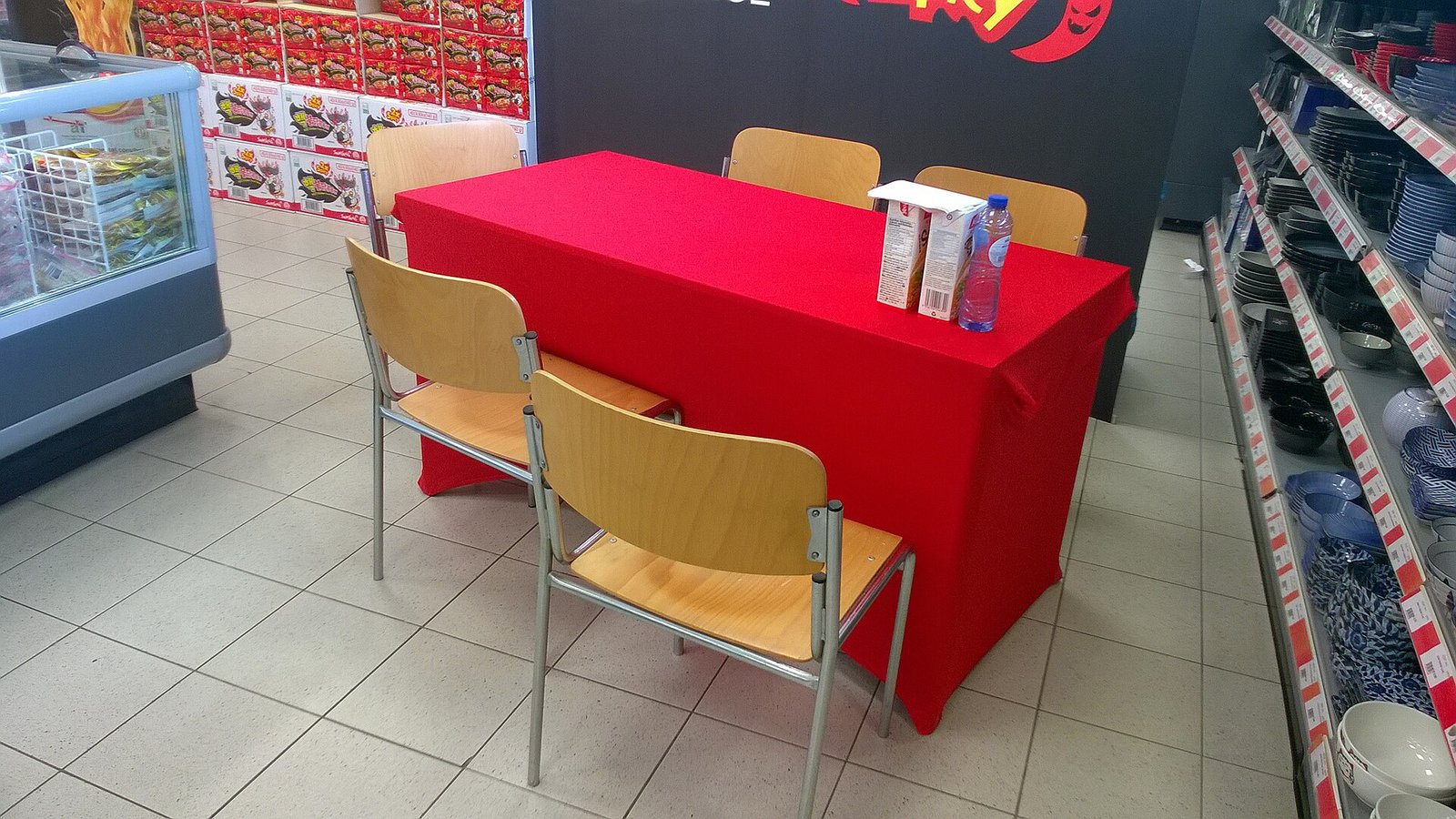 An eating competition involving very spicy South Korean noodles (bami) inside of an Amazing Oriental (東方行) supermarket in the city of Gro…